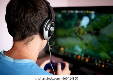 Man Playing Computer Games Stock Photo (Edit Now) 668414950