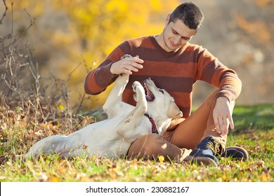 Man Playing With Dog