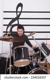 man playing drums
