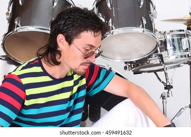 man playing the drums 
