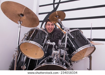 man playing drums