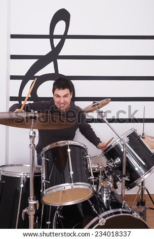 man playing drums