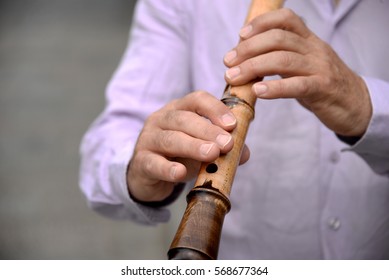 Man Playing The Flute Shakuhachi