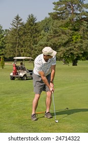 Man Playing Golf