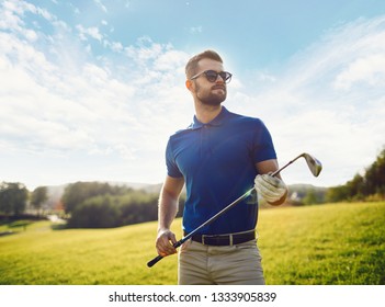 Man playing golf . Golf player on Beautiful Golf Course in the sunrise. - Powered by Shutterstock