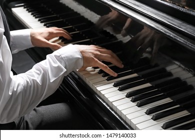 Man Playing Grand Piano At The Concert, Closeup