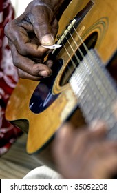 Man Playing Guitar