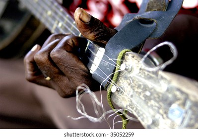 Man Playing Guitar