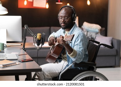 Man Playing Guitar During Live Broadcasting