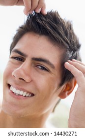 Man Playing With Hair Smiling