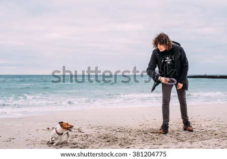 Similar – Foto Bild glücklicher Jack Russell Hund, der bei Sonnenuntergang auf einem Holzpier läuft.