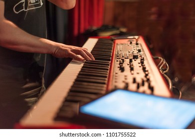 man playing keyboard