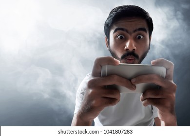 Man Playing Mobile Game