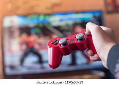 Man is playing on the console