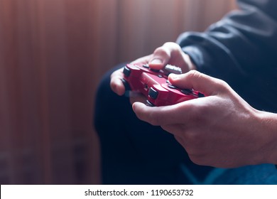 Man is playing on the console