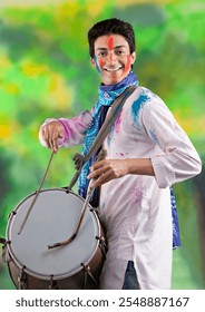 Man playing on a dhol