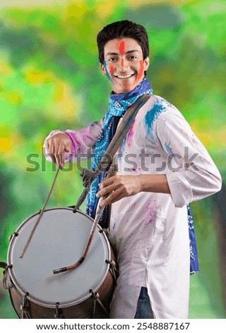 Man playing on a dhol