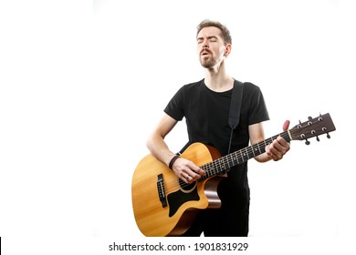 Man Playing On The Guitar On The White Background