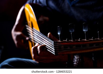 A Man Playing Oud Instrument, Vintage Style