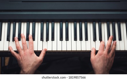 Man Playing Piano, Top View