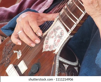 Man Playing Sitar