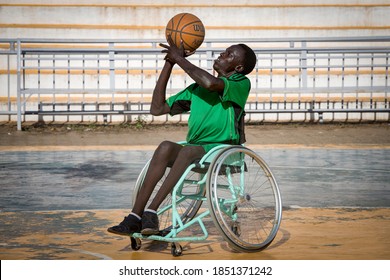 Man playing wheelchair basketball in Juba, South Sudan on 2017-07-25 