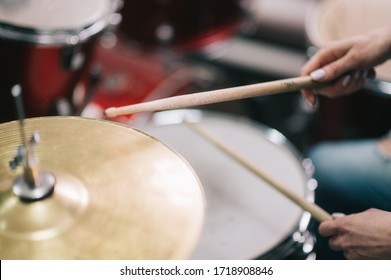 Man Plays The Drums And Crash Cymbal With Drumsticks