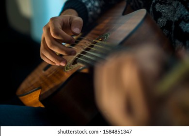 Man Plays Guitar At Night.