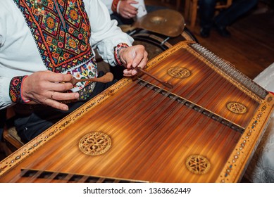 Man Plays On A Hammered Dulcimer