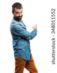 Man pointing back