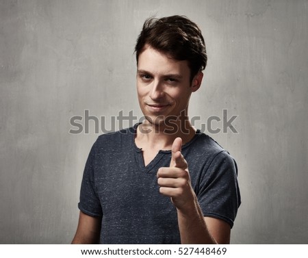 Man pointing to the camera