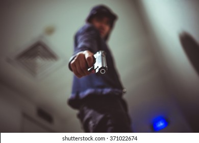 Man Pointing A Gun At You