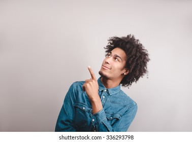 Man Pointing To The Up Over Background