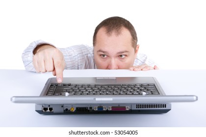 man pointing something on screen of laptop
