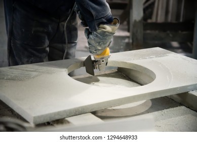 Man Polishing Marble Stone Table By Small Angle Grinder. Stone Cutter
