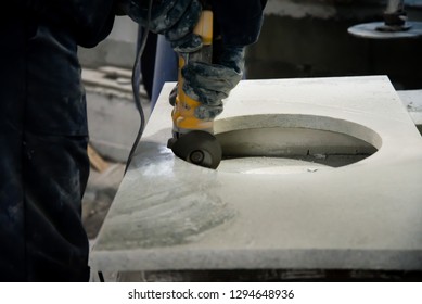 Man Polishing Marble Stone Table By Small Angle Grinder. Stone Cutter