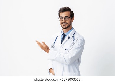 Man portrait of a doctor wearing a white coat and eyeglasses and a stethoscope looking into the camera on a white isolated background, copy space, space for text, health - Shutterstock ID 2278090533