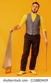 Man Portrait Posing While Holding His Musical Saw