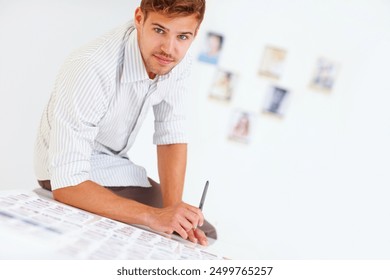 Man, portrait and review photography in office, photographer and editing images at creative agency. Male person, employee and photo journalist for portfolio, project management and plan photoshoot - Powered by Shutterstock