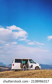 Man portrait while travelling with camper van. Concept of modern people lifestyle in smart working or digital nomad freedom. Copy space. - Shutterstock ID 2138986317