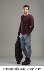 man posing on gray background