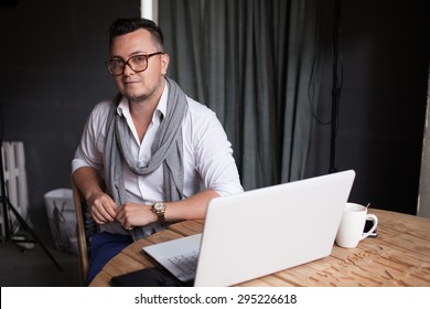Man posing on workplace in startup office
