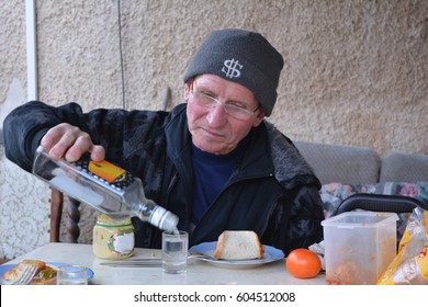 man-pouring-vodka-into-glass-260nw-60451