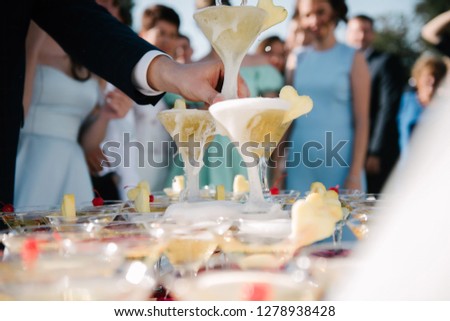 Similar – Freunde am Tisch mit frischer Limonade, die Spaß macht.