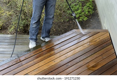 Man Power Washing Deck