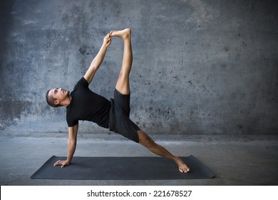 Man Practicing Advanced Yoga Against Urban Stock Photo 221678527 