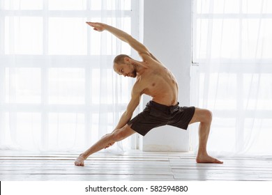 Man practicing advanced yoga. A series of yoga poses. lifestyle concept. - Powered by Shutterstock