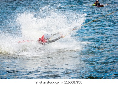 The Man Is Practicing The Start Of The Surfboard Slide On The Water Ski Lift On Lake Trzesiecko In Szczecinek. 