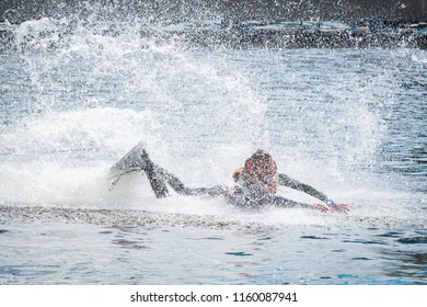 The Man Is Practicing The Start Of The Surfboard Slide On The Water Ski Lift On Lake Trzesiecko In Szczecinek. 