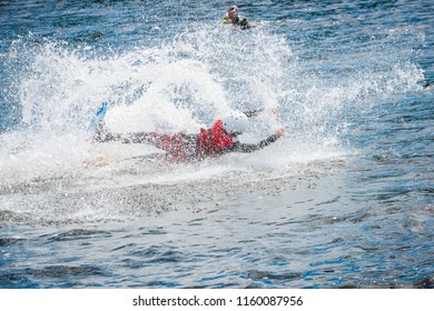 The Man Is Practicing The Start Of The Surfboard Slide On The Water Ski Lift On Lake Trzesiecko In Szczecinek. 